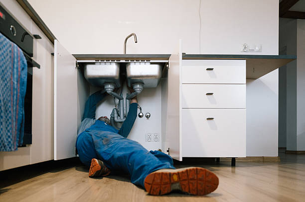 Professional Emergency Plumber technician working in Whick, KY